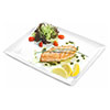 Grilled salmon steak with Pesto sauce photo - served with mixed salad, lemon