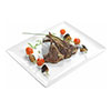 Grilled lamb rack with vegetable skewers and rosemary and mint sauce photo